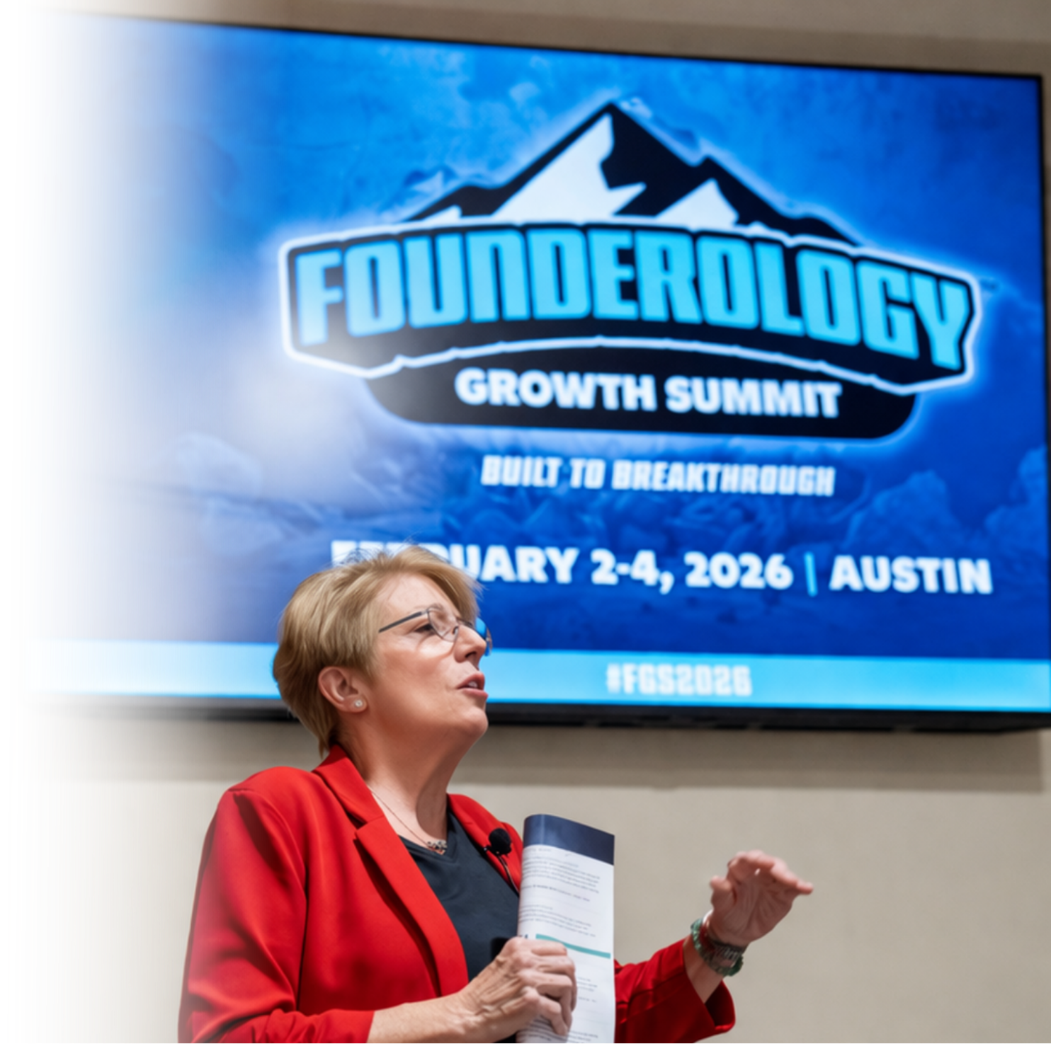 Kathleen Wood - Smiling woman with short blonde hair and glasses.